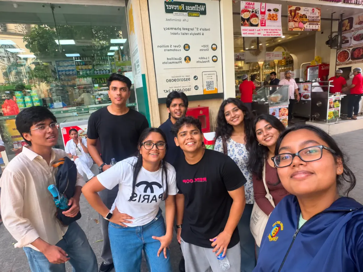 City scavenger hunt group; AI-retouched photograph with two added women